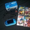 Sony PSP in vibrant blue + games + case