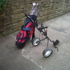 Full set of top flite golf clubs with bag and trolley