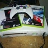 white xbox 360 with 2 games and pad