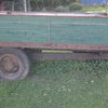 Tipping trailer for a tractor