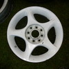 set of 4 white multi fit rims (peugeot,citreon,ford,honda,toyota etc....)