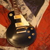 Vintage V100 Les Paul Guitar Black w/ Gold Hardware