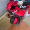petite star kurvi pram in red