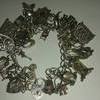 vintage silver charm bracelet with 35 charms, over 3oz heavy