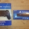 ps4 camera and playstation 4  daulshock 4 controller in boxes