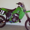 NEW PHOTOS LOOK ..  Starts . runs kx 80 just needs chain