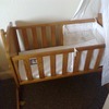 winnie the pooh swinging crib good condition- cots