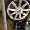 Alloy weel with trees for golf and Audi