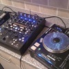 A Pair of Denon DN-S5000 CDJs and Behringer DDM 4000 mixer. DJ turntable