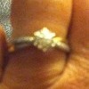 9ct gold ring with bit of white gold on arms with diamonds