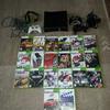 Xbox 360 slim,160 gb with 20 games, 3 controllers
