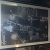 Large poster/ autographed by James T