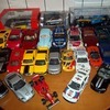 LARGE COLECTION OF DIECAST CARS 1/18 AND 1/24. SOME ARE STILL BOXED