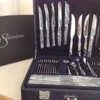 Suissine 96 peice cutlery set - silver with 24 carat gold plated.
