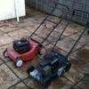 2x petrol lawn mowers