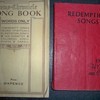 Two old books. Redemption songs, Song book.