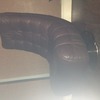 Retro style brown leather curved swivel chair