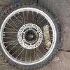 RM 80 front wheel complete...