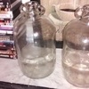 two glass rum making bottles can also be used for coins
