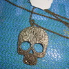 a very nice large skull on a chain new