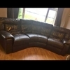 Brown leather corner sofa.