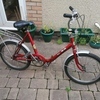 Old school fold up bike.