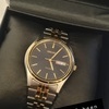 Seiko mens two toned gold an steel