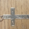 A.J.H Antique patterned cross