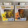 2x Funko Pops Signed Graded Pokemon