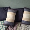 4 nice decorative filled cushions.