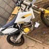 Husqvarna  350fe on road.  Surron ?