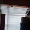 Bay window vertical blinds.