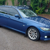 BMW 320d estate, in metallic blue