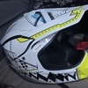 Two large motocross helmets